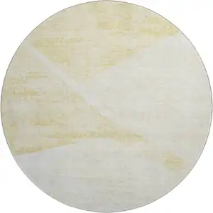 Photo of 8' Gold And Ivory Geometric Washable Round Rug With UV Protection