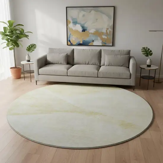 8' Gold And Ivory Geometric Washable Round Rug With UV Protection Photo 2