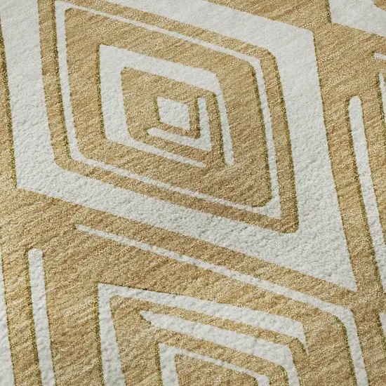 8' Gold And Ivory Geometric Washable Round Rug With UV Protection Photo 8