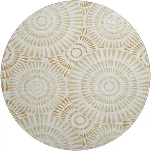 Photo of 8' Gold And Ivory Geometric Washable Round Rug With UV Protection