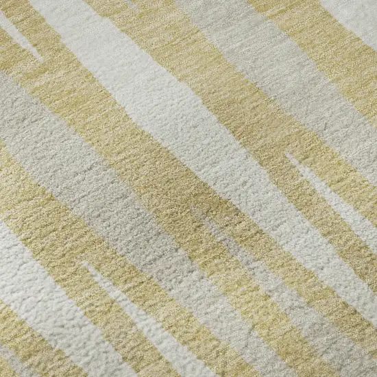 8' Gold And Ivory Geometric Washable Round Rug With UV Protection Photo 9