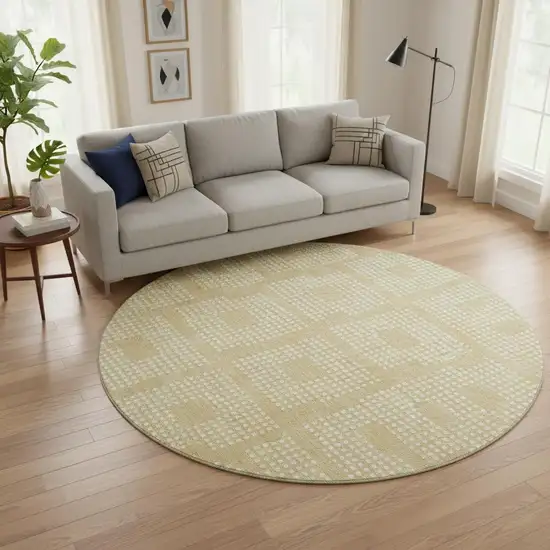 8' Gold And Ivory Geometric Washable Round Rug With UV Protection Photo 2