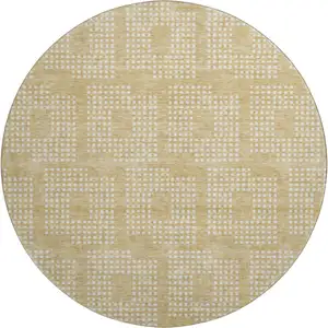 Photo of 8' Gold And Ivory Geometric Washable Round Rug With UV Protection
