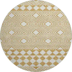 Photo of 8' Gold And Ivory Geometric Washable Round Rug With UV Protection