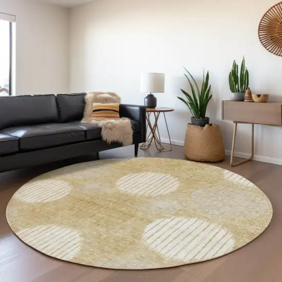 8' Gold And Ivory Geometric Washable Round Rug With UV Protection Photo 5