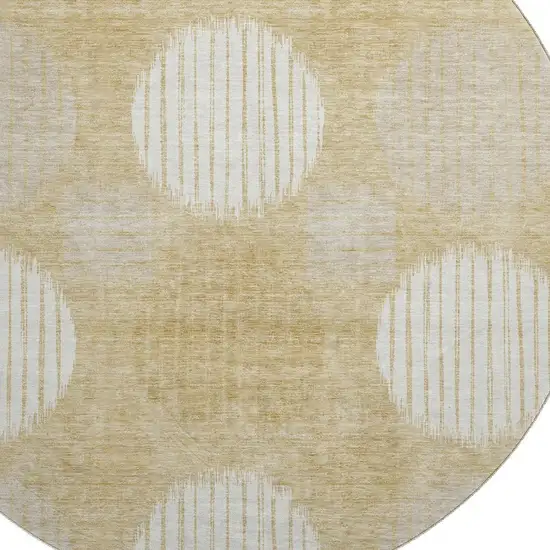 8' Gold And Ivory Geometric Washable Round Rug With UV Protection Photo 3