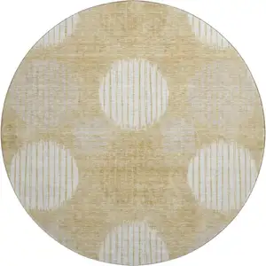 Photo of 8' Gold And Ivory Geometric Washable Round Rug With UV Protection