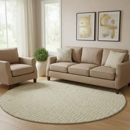 8' Gold And Ivory Geometric Washable Round Rug With UV Protection Photo 1
