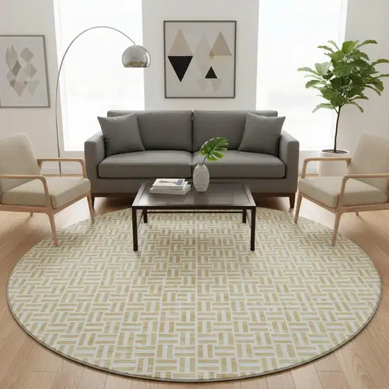 8' Gold And Ivory Geometric Washable Round Rug With UV Protection Photo 2
