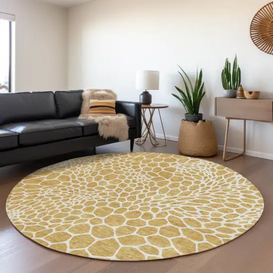 8' Gold And Ivory Geometric Washable Round Rug With UV Protection Photo 5