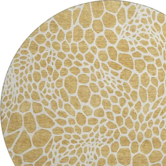 8' Gold And Ivory Geometric Washable Round Rug With UV Protection Photo 3