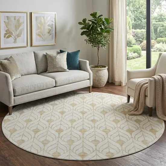 8' Gold And Ivory Geometric Washable Round Rug With UV Protection Photo 1