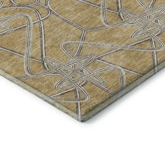 8' Gold And Ivory Geometric Washable Round Rug With UV Protection Photo 6