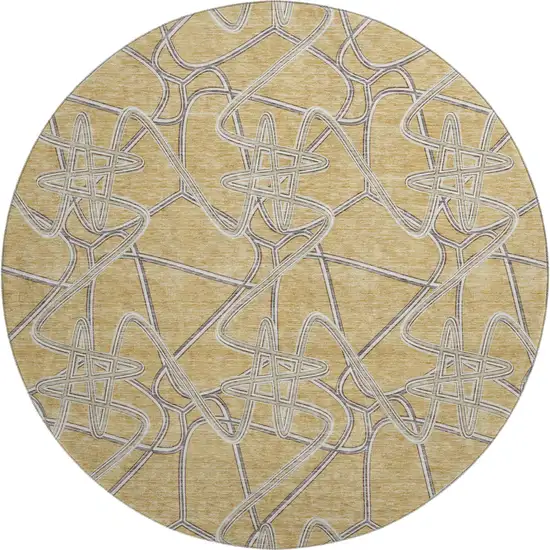 8' Gold And Ivory Geometric Washable Round Rug With UV Protection Photo 1