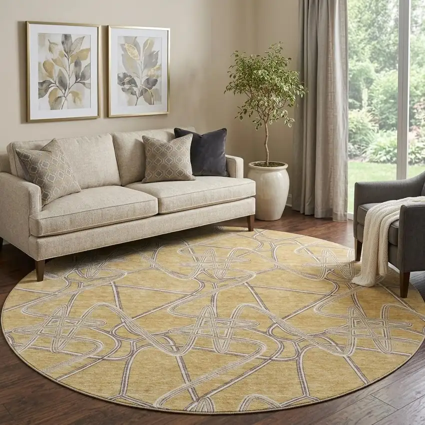 8' Gold And Ivory Geometric Washable Round Rug With UV Protection Photo 1