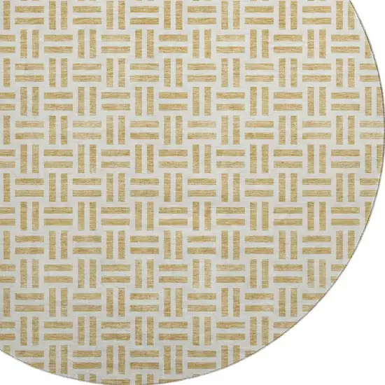 8' Gold And Ivory Geometric Washable Round Rug With UV Protection Photo 2
