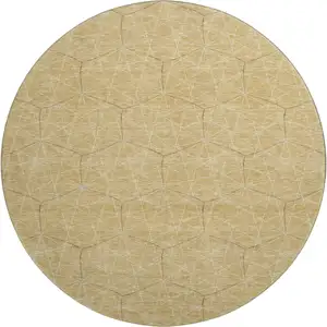 Photo of 8' Gold And Ivory Geometric Washable Round Rug With UV Protection