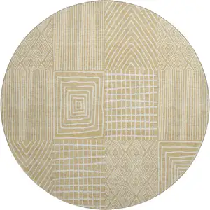 Photo of 8' Gold And Ivory Geometric Washable Round Rug With UV Protection