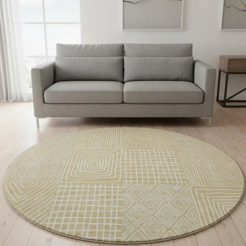 8' Gold And Ivory Geometric Washable Round Rug With UV Protection Photo 2