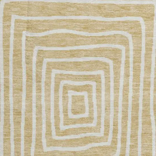 8' Gold And Ivory Geometric Washable Round Rug With UV Protection Photo 2