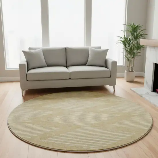 8' Gold And Ivory Geometric Washable Round Rug With UV Protection Photo 2