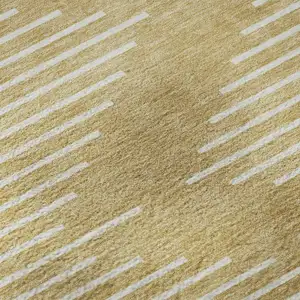 Photo of 8' Gold And Ivory Geometric Washable Round Rug With UV Protection