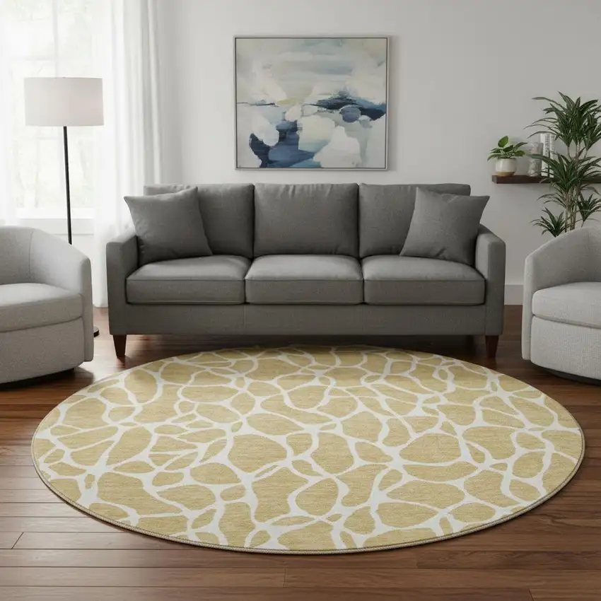 8' Gold And Ivory Geometric Washable Round Rug With UV Protection Photo 2