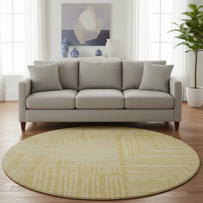 8' Gold And Ivory Geometric Washable Round Rug With UV Protection Photo 2