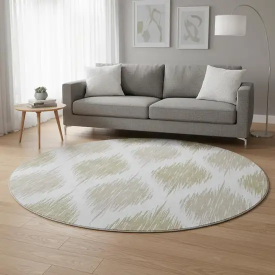 8' Gold And Ivory Ikat Washable Round Rug With UV Protection Photo 2