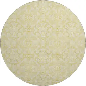 Photo of 8' Gold And Ivory Medallion Washable Round Rug With UV Protection
