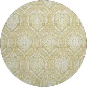 Photo of 8' Gold And Ivory Medallion Washable Round Rug With UV Protection