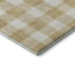 Photo of 8' Gold And Ivory Plaid Washable Round Rug With UV Protection