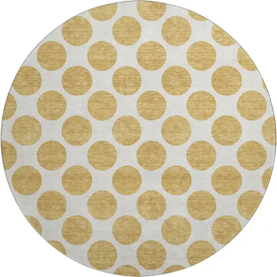8' Gold And Ivory Polka Dot Washable Round Rug With UV Protection Photo 1