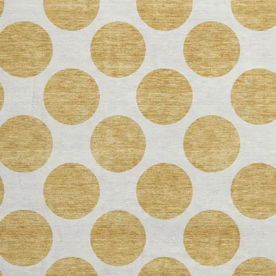 8' Gold And Ivory Polka Dot Washable Round Rug With UV Protection Photo 2