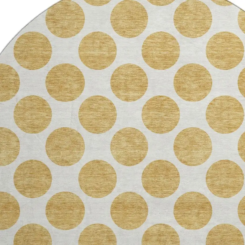 8' Gold And Ivory Polka Dot Washable Round Rug With UV Protection Photo 3