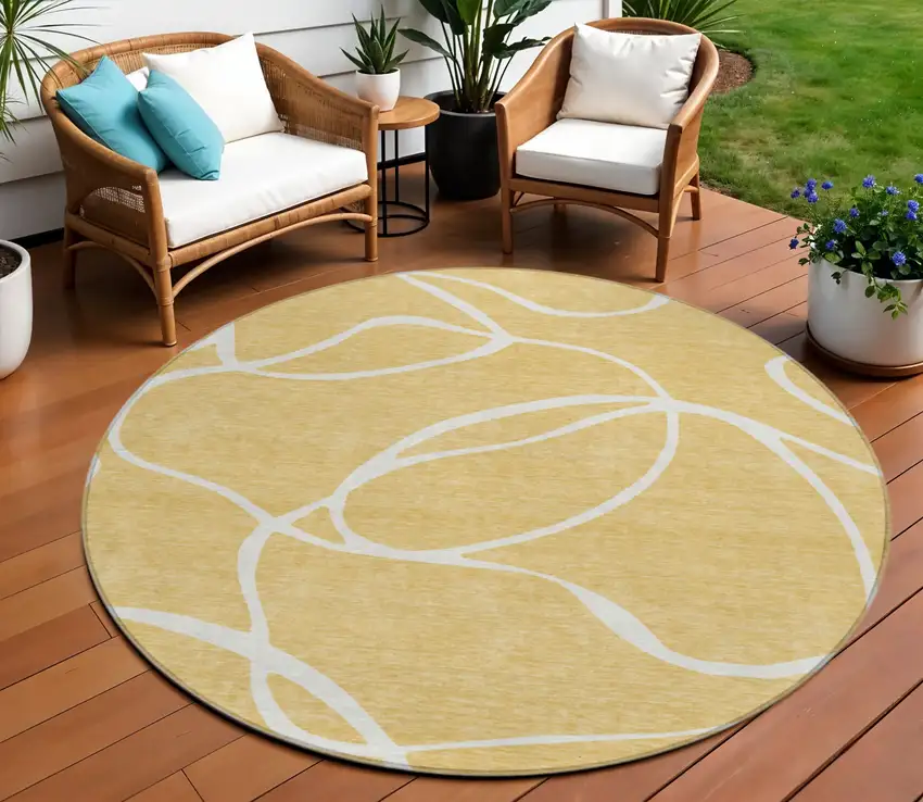 8' Gold And Ivory Round Abstract Washable Indoor Outdoor Area Rug Photo 1