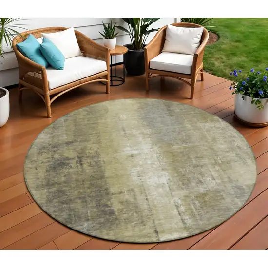 8' Gold And Ivory Round Abstract Washable Indoor Outdoor Area Rug Photo 2
