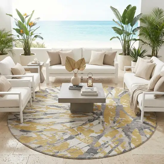 8' Gold And Ivory Round Abstract Washable Indoor Outdoor Area Rug Photo 1