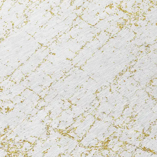 8' Gold And Ivory Round Abstract Washable Indoor Outdoor Area Rug Photo 7
