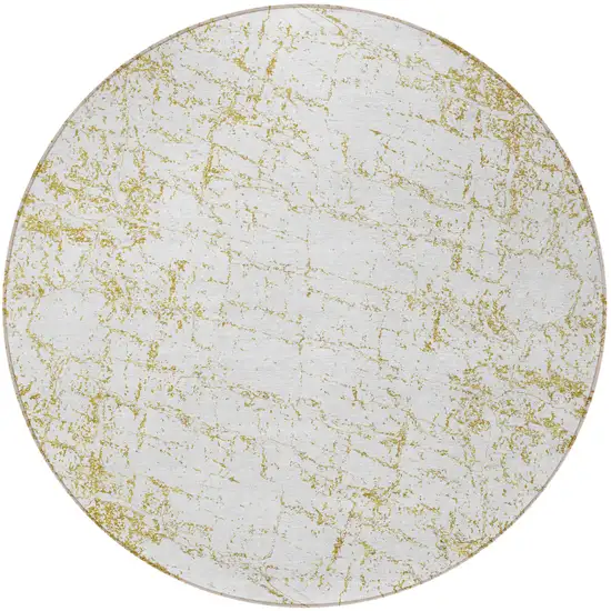 8' Gold And Ivory Round Abstract Washable Indoor Outdoor Area Rug Photo 4