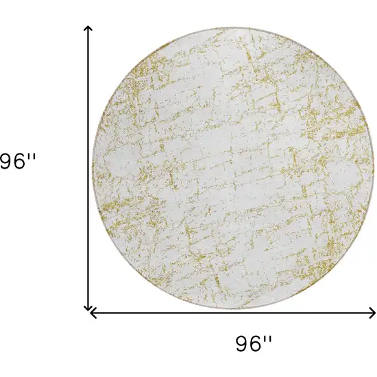 8' Gold And Ivory Round Abstract Washable Indoor Outdoor Area Rug Photo 3