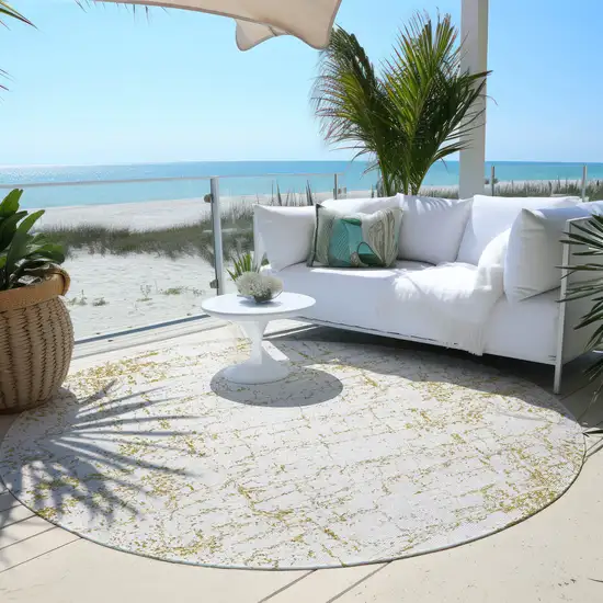 8' Gold And Ivory Round Abstract Washable Indoor Outdoor Area Rug Photo 5