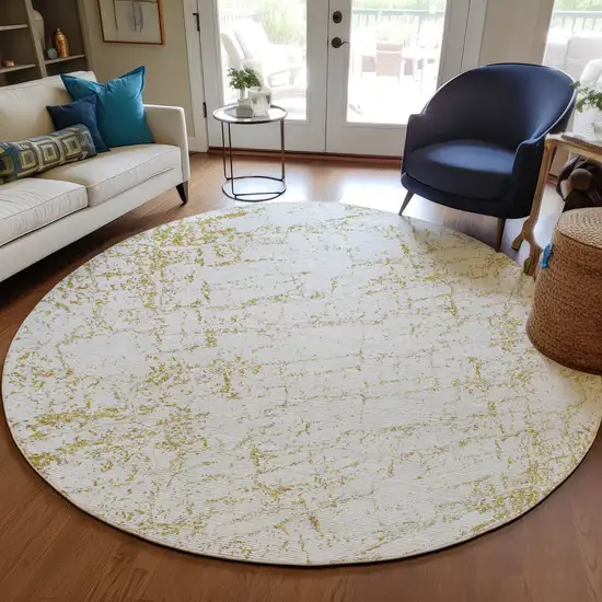 8' Gold And Ivory Round Abstract Washable Indoor Outdoor Area Rug Photo 6