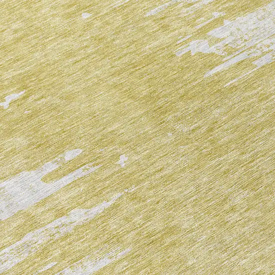 8' Gold And Ivory Round Abstract Washable Indoor Outdoor Area Rug Photo 9