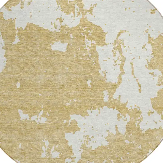 8' Gold And Ivory Round Abstract Washable Indoor Outdoor Area Rug Photo 4