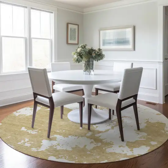 8' Gold And Ivory Round Abstract Washable Indoor Outdoor Area Rug Photo 7