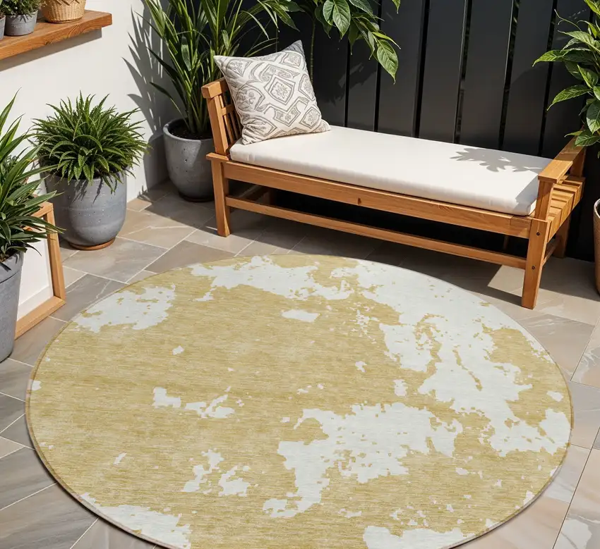 8' Gold And Ivory Round Abstract Washable Indoor Outdoor Area Rug Photo 1