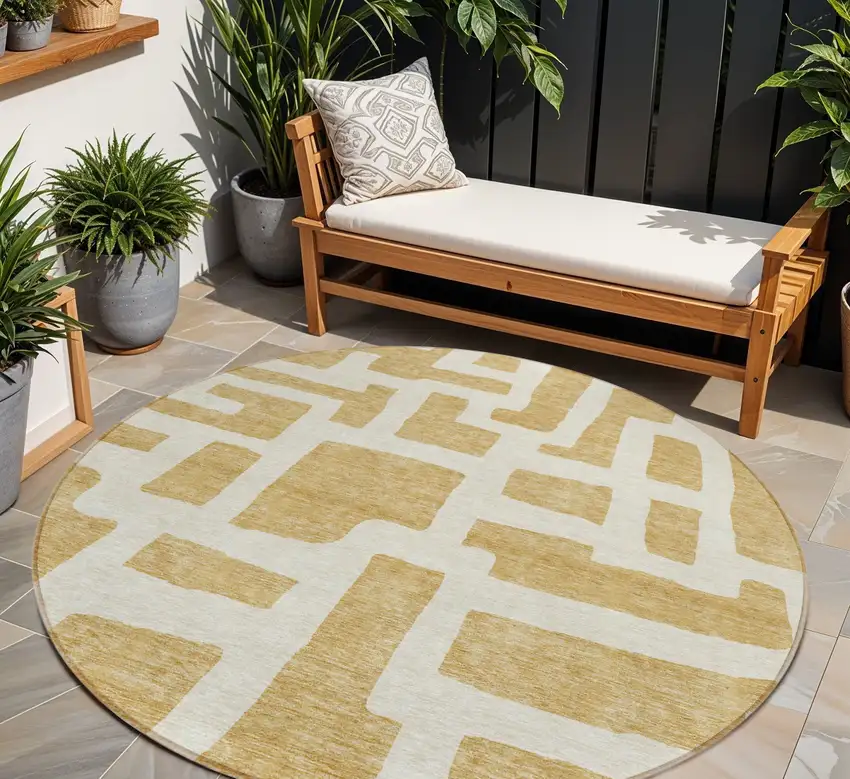 8' Gold And Ivory Round Abstract Washable Indoor Outdoor Area Rug Photo 1