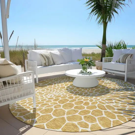 8' Gold And Ivory Round Geometric Washable Indoor Outdoor Area Rug Photo 7