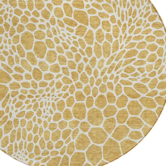 8' Gold And Ivory Round Geometric Washable Indoor Outdoor Area Rug Photo 5